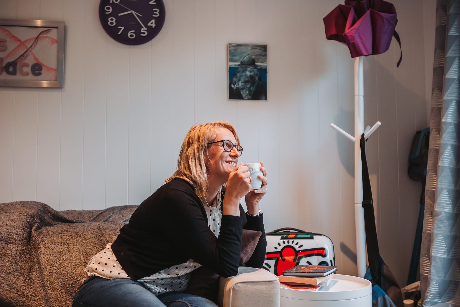 Dr Helen Ross with a cup of tea in her garden office